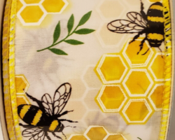 BEES HNYCMB WH SAT-2.5” WR
This bow could be used for any occasion. Streamers will be solid ribbon in the colors of black, yellow, green and white. If available, a text streamer for the desired occasion could be added.