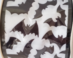 BLK BATS WH SAT-2.5” WR
This bow is for a Halloween collection. Streamers will be solid ribbons in the colors of black and white. If available, a coordinating text streamer could be added.
