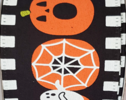BOO GOST PMKN BLK LIN-2.5” WR **GLOWS IN THE DARK**
This bow is for a Halloween collection. Streamers will be solid ribbon in the colors of orange, black and white. If available, a coordinating “Boo” text streamer could be added.
