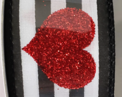 GLT HRT BW STRP-1.5” WR
This bow could be used for Valentine’s Day or anniversary. Streamers will be solid ribbon in the colors of red, black and white. If available, a coordinating text streamer for the desired occasion could be added.