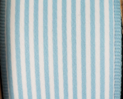 LT BLU WH STRP-1.5” **(THIS IS NOT A FORMED BOW BY ITSELF!)**
THIS BOW WILL BE FLOPPY UNLESS USED IN CONJUNCTION WITH A SOLID WIRED RIBBON. It could be used for any occasion. Streamers will be solid ribbon in the colors of blue and white. If available, a coordinating text streamer for the desired occasion could be added.
