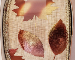 FOIL LEAVES TAN LIN-2.5" WR This bow is for a fall collection. Streamers will be solid ribbon in coordinating colors. If available, a coordinating text streamer for the desired occasion could be added.