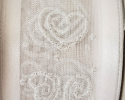 SHR SWRL HRTS WH SAT-1.5” WR
This bow could be used for a bridal shower or wedding. Streamers will be solid ribbon in the color of white and a coordinating text streamer could be added.