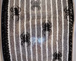 SPDR MET SLVR-2.5" WR This bow is for a Halloween collection. Streamers will be solid ribbon in the colors of silver and black. If available, a coordinating text streamer could be added.